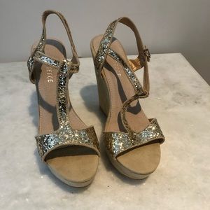 Women’s gold and suede glitter sandals